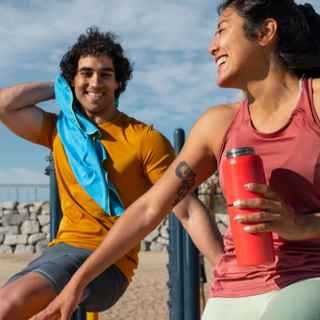 Protein powders and vitamins laid out for summer fitness routine